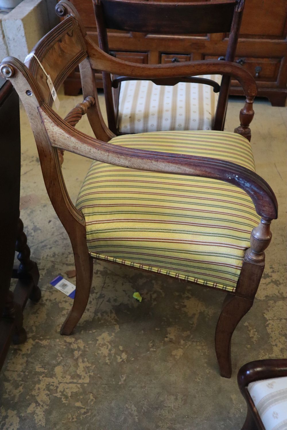 A Regency mahogany carver and a pair of dining chairs (3)